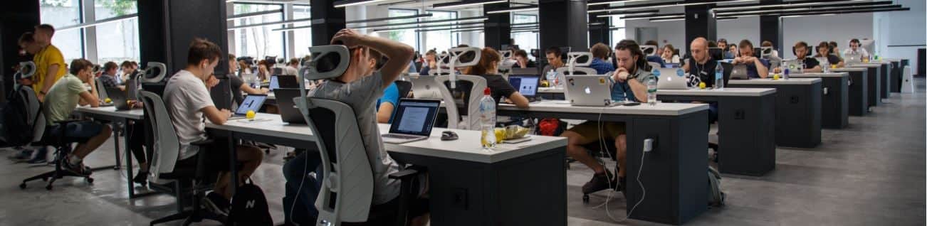 workplace_alex_kotliarskyi large workplace filled with employees at desks