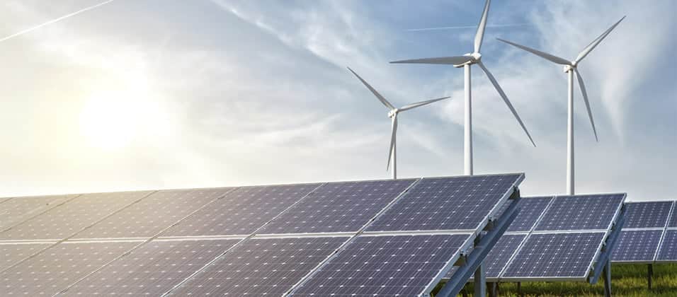 Solar Panels Wind Generators Blue Sky Sunset 956 x 420. jpg