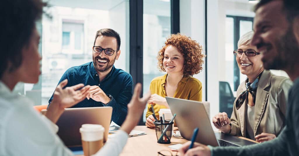 Smiling In Business Meeting. jpg 2560 x 1338