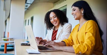 women with laptop large promo 2560 x 1338